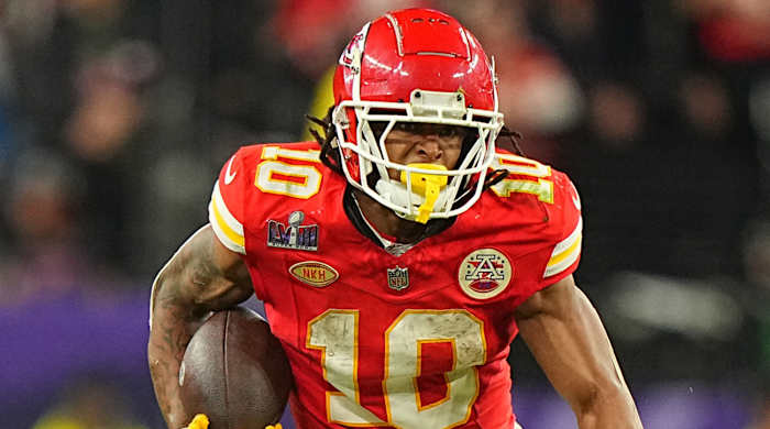 Cheifs’ Isiah Pacheco runs past the 49ers defense in Super Bowl 58.